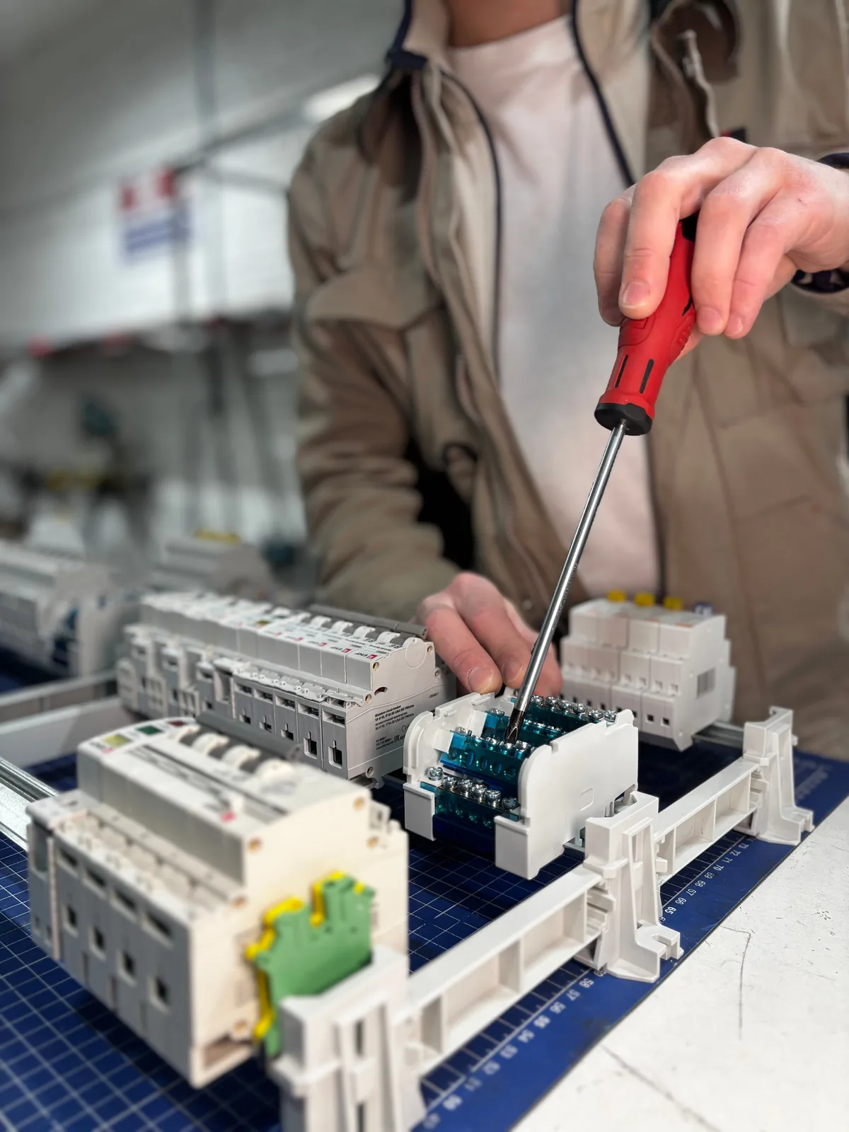Breakers assembled on a DIN rail before installation, for licensed electrician in Oakville