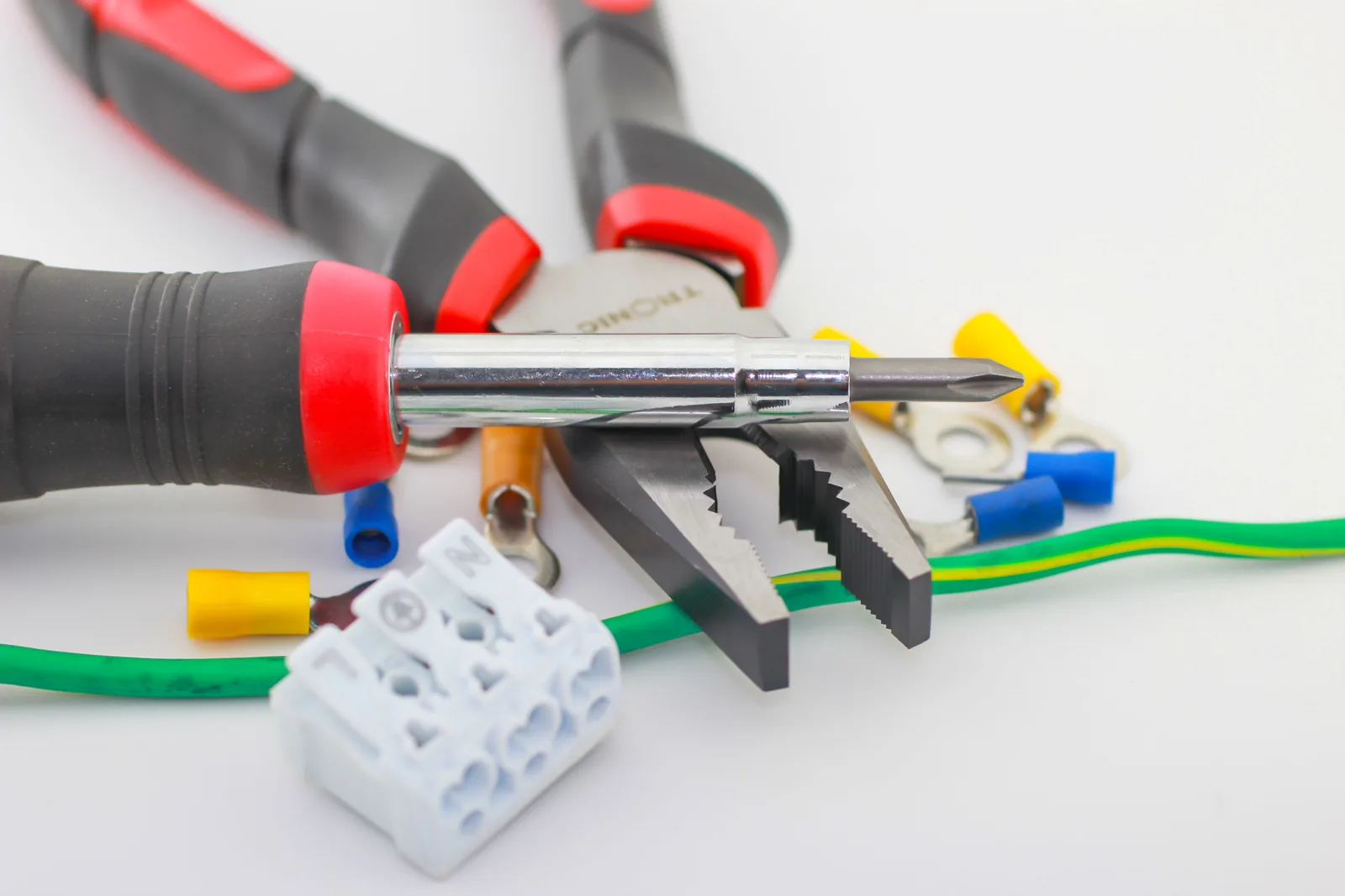 Pliers, a screwdriver, ferrules and a connector block, for electrician in Oakville