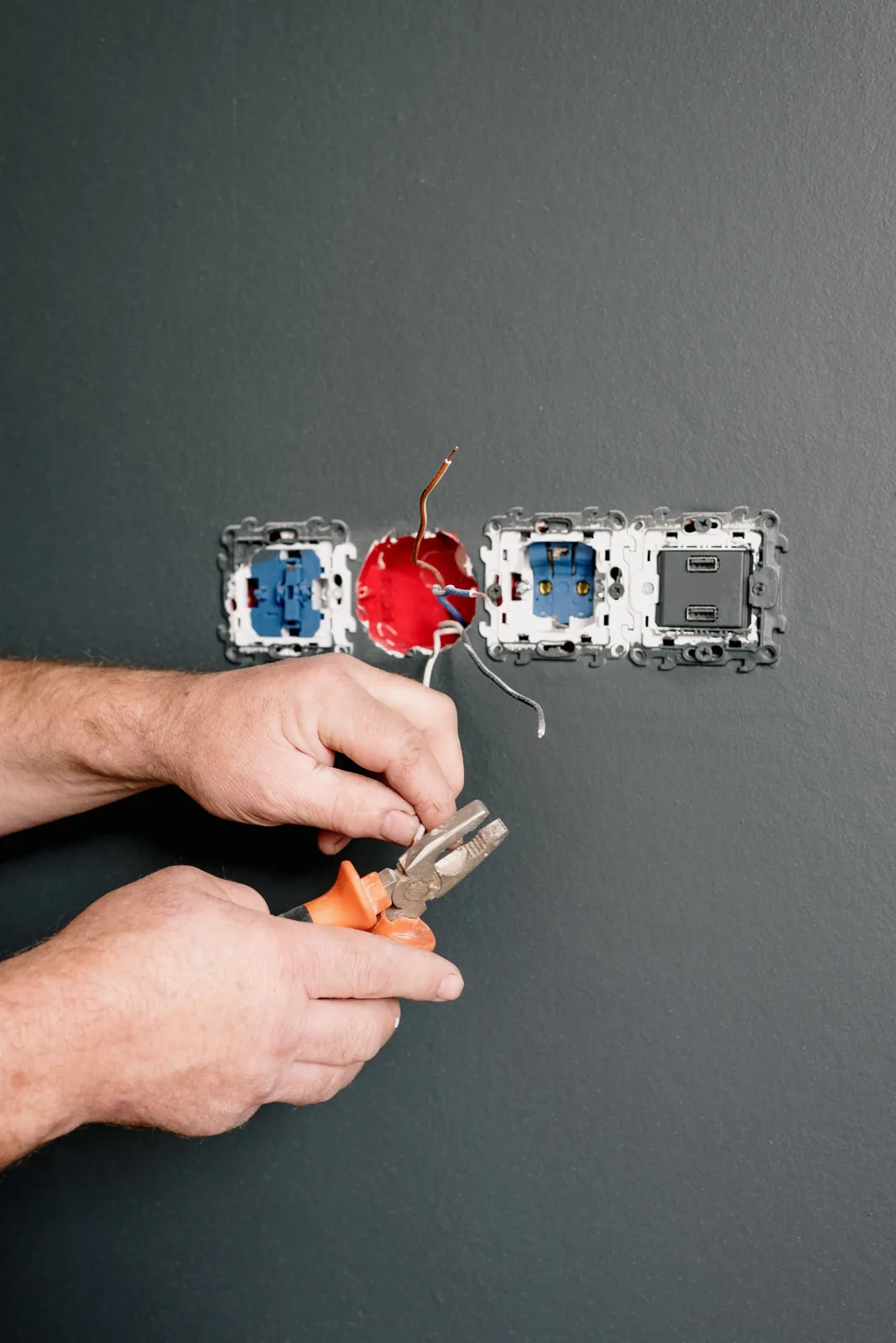 Wiring an outlet box into a finished wall, for code violation in Oakville