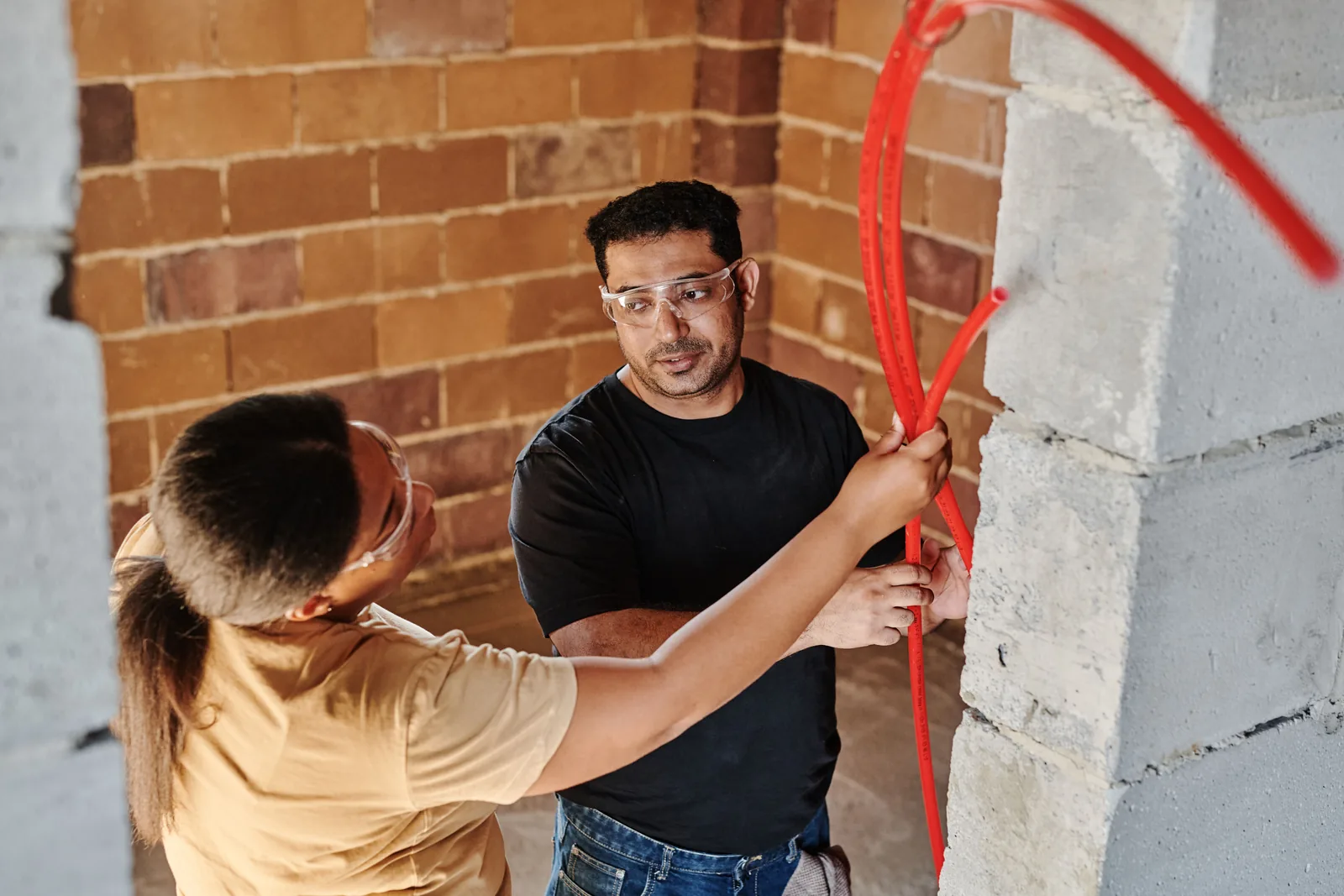 Running conduit across a block wall, for property management electrical in Oakville