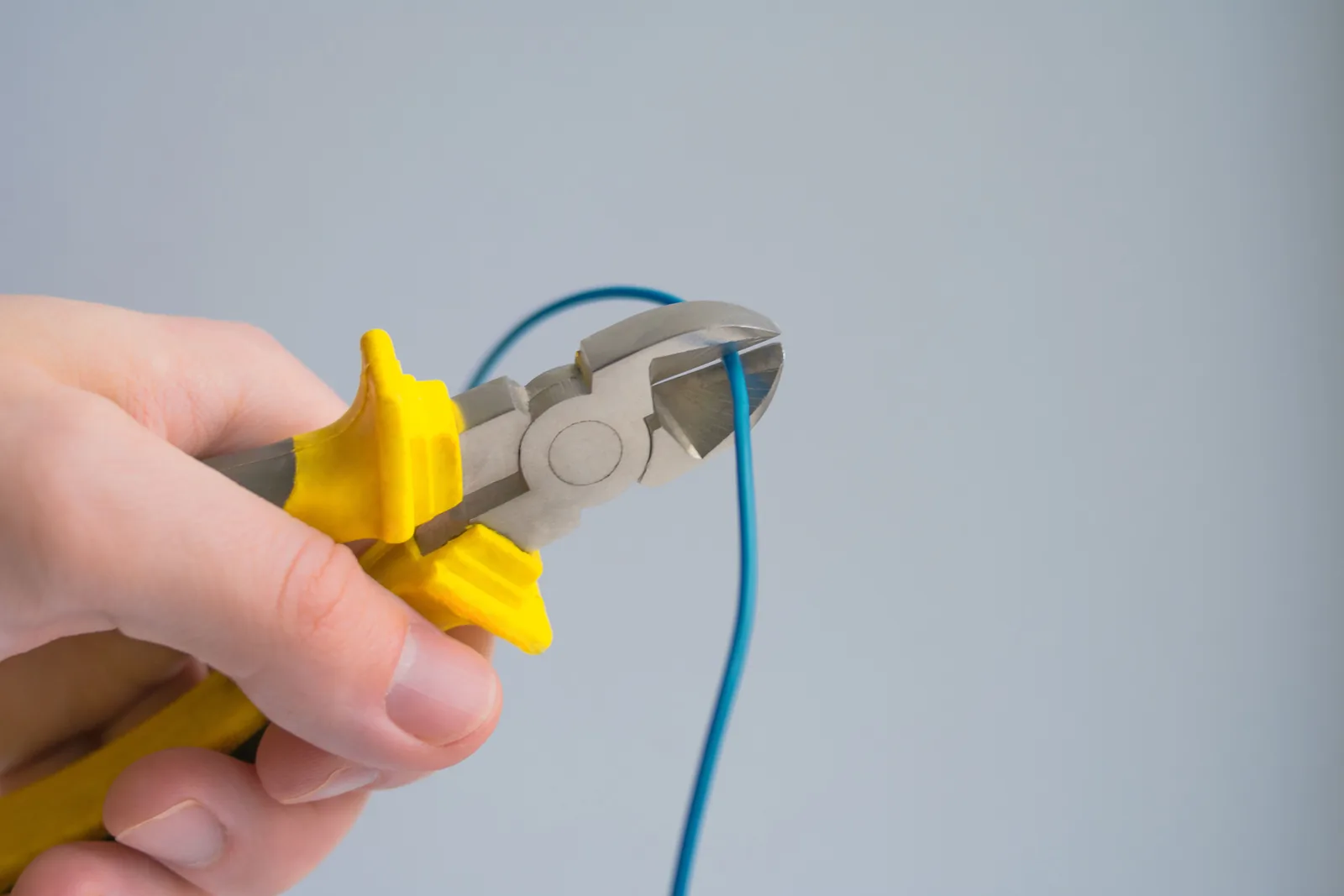 Cutting a conductor to length, for licensed electrician in Oakville